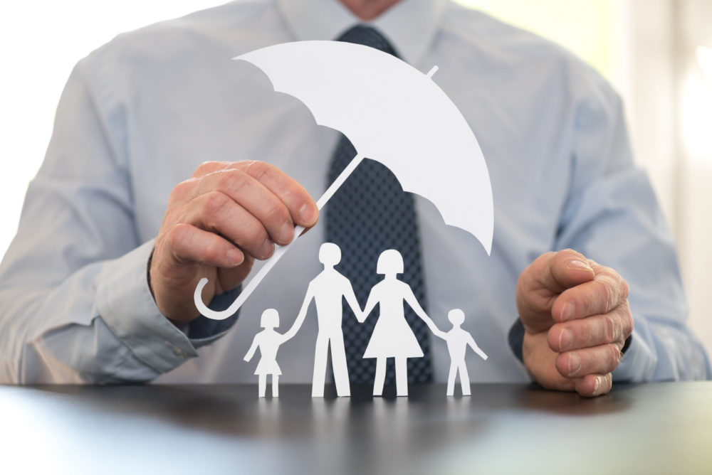 umbrella over family